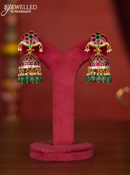 Jadau jhumka floral design with jadau stones and green beads hanging