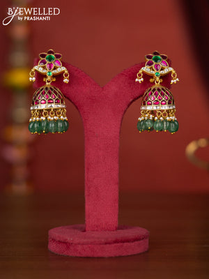 Jadau jhumka floral design with jadau stones and green beads hanging