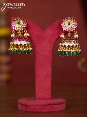 Jadau jhumka floral design with jadau stones and green beads hanging