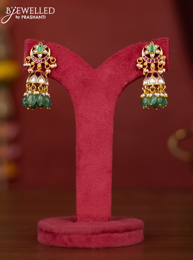 Jadau jhumka floral design with jadau stones and green beads hanging