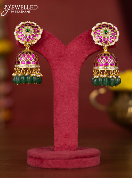 Jadau jhumka floral design with jadau stones and green beads hanging