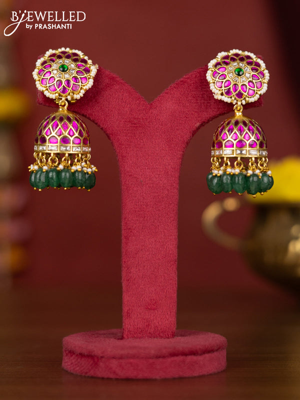 Jadau jhumka floral design with jadau stones and green beads hanging