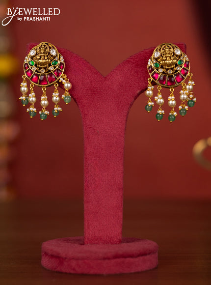 Jadau lakshmi earring with jadau kundan stones and pearl hanging