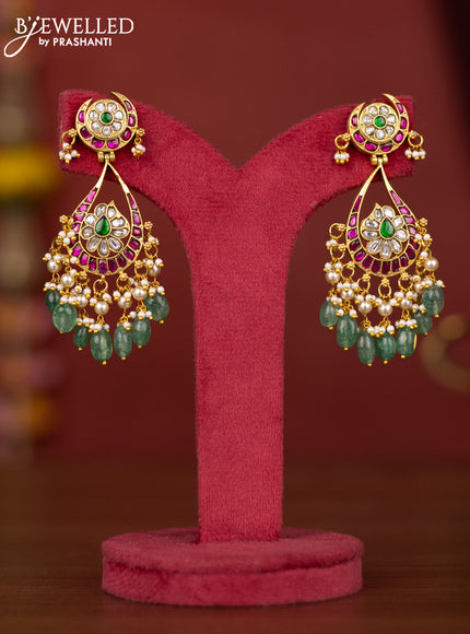 Jadau floral earring with jadau kundan stones and green beads hanging