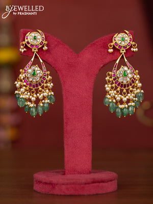 Jadau floral earring with jadau kundan stones and green beads hanging