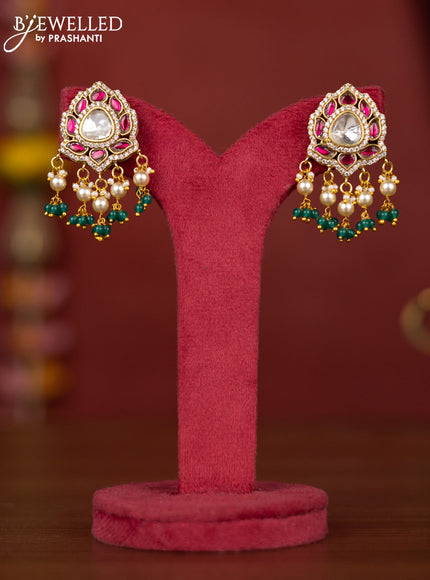 Jadau earring with jadau & mozanite stones and pearl beads hanging