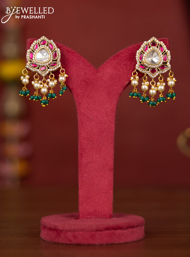 Jadau earring with jadau & mozanite stones and pearl beads hanging
