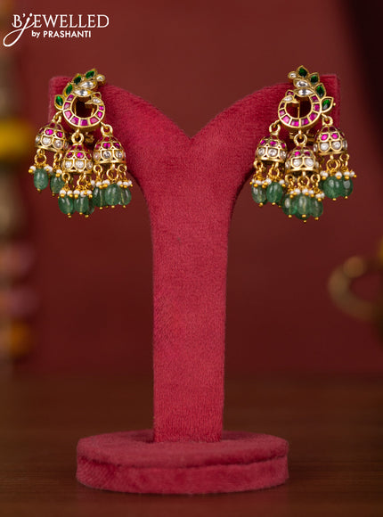 Jadau jhumka leaf design with jadau stones and rice pearl hanging