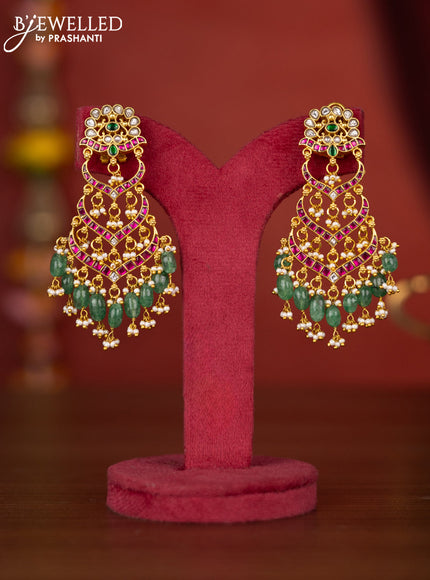 Jadau earring with jadau stones and green beads hanging