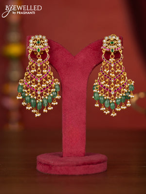 Jadau earring with jadau stones and green beads hanging