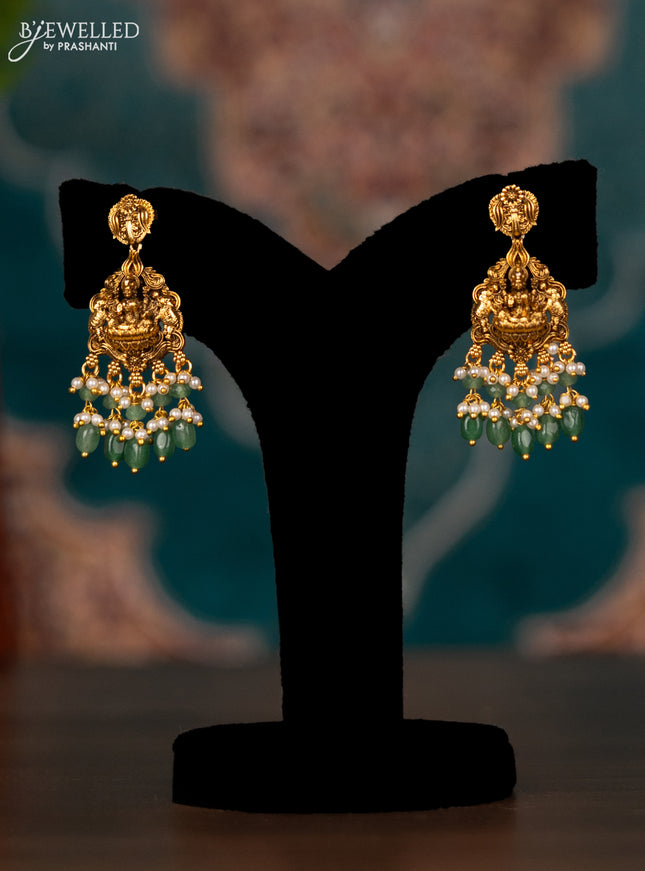 Antique haram lakshmi kasu design with lakshmi pendant and pearl & mint green beads hangings