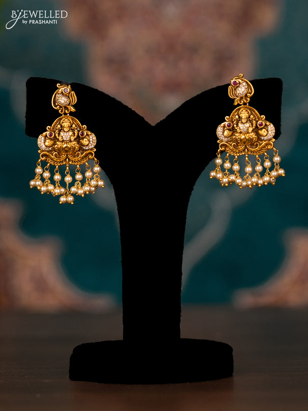 Antique haram lakshmi design with pink kemp & cz stones and pearl hangings
