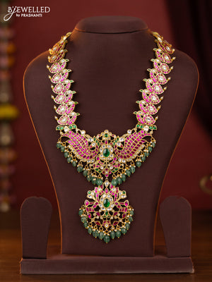 jadau peacock design haram with jadau kundan stones and green beads hanging