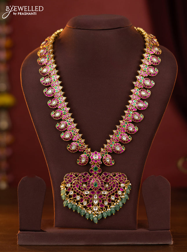 Jadau maanga haaram with double peacock design jadau kundan stones pendant & green beads hanging
