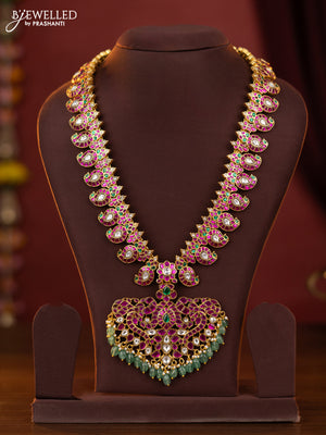 Jadau maanga haaram with double peacock design jadau kundan stones pendant & green beads hanging