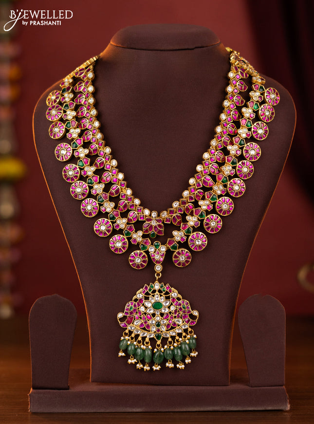 Jadau double layer bottumala maanga haaram with double peacock pendant in jadau kundan stones and green beads haging
