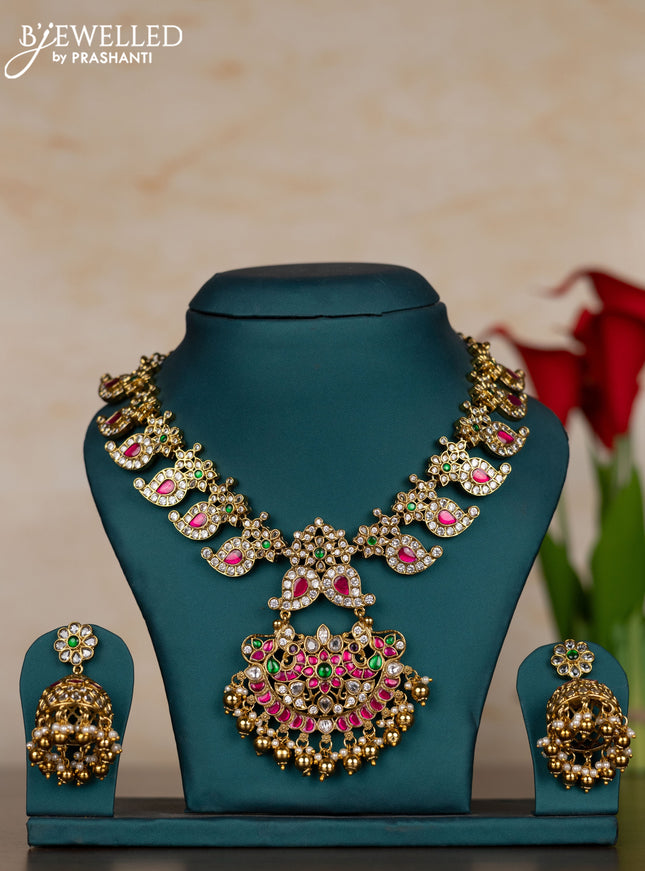 Jadau necklace with kemp jadau kundan stones and pearl & golden beads hangings
