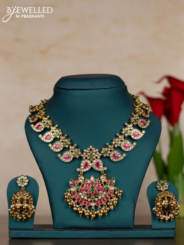 Jadau necklace with kemp jadau kundan stones and pearl & golden beads hangings