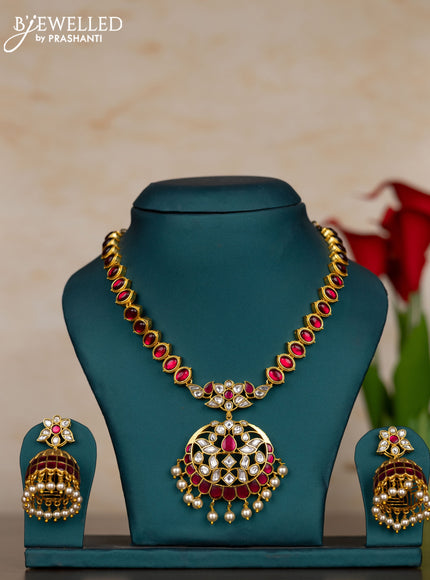 Jadau necklace with pink jadau kundan stones and pearl hangings