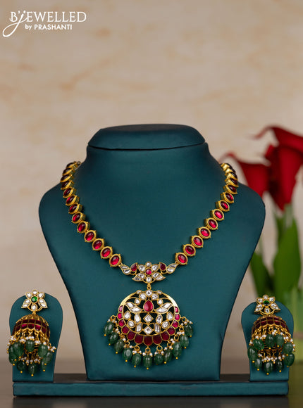 Jadau necklace with pink jadau kundan stones and pearl & green beads hangings