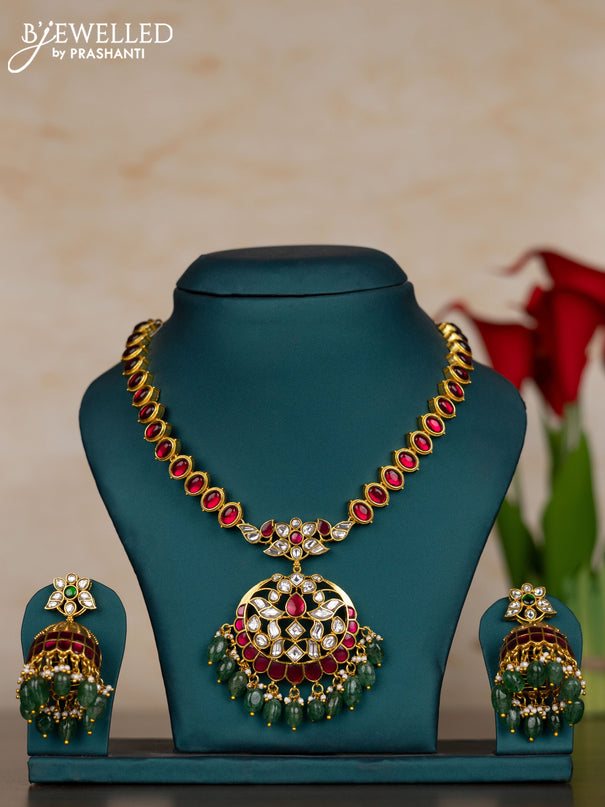 Jadau necklace with pink jadau kundan stones and pearl & green beads hangings