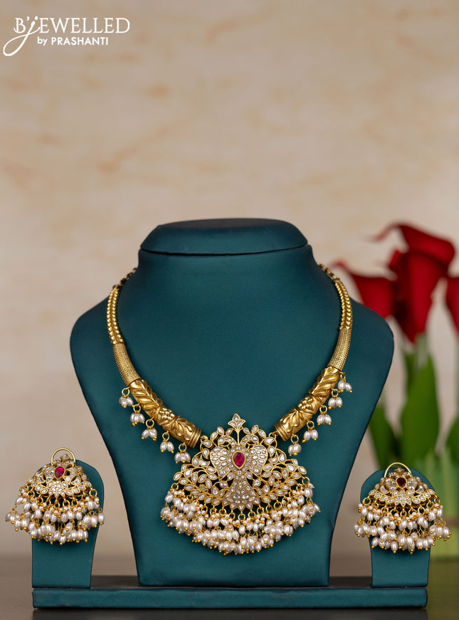 Jadau necklace with pink jadau kundan stones and pearl & mint green beads hangings