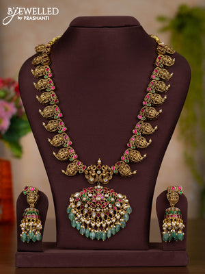 Jadau haaram lakshmi & manga pattern with kemp jadau kundan stones and pearl & green beads hangings