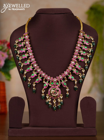 Jadau haaram with kemp jadau kundan stones and pearl & green beads hangings