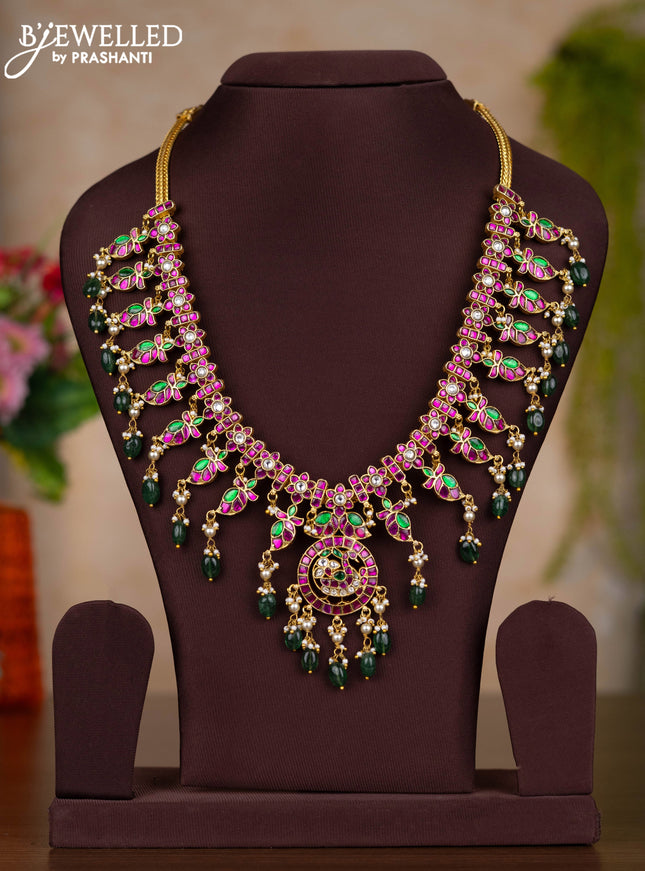 Jadau haaram with kemp jadau kundan stones and pearl & green beads hangings