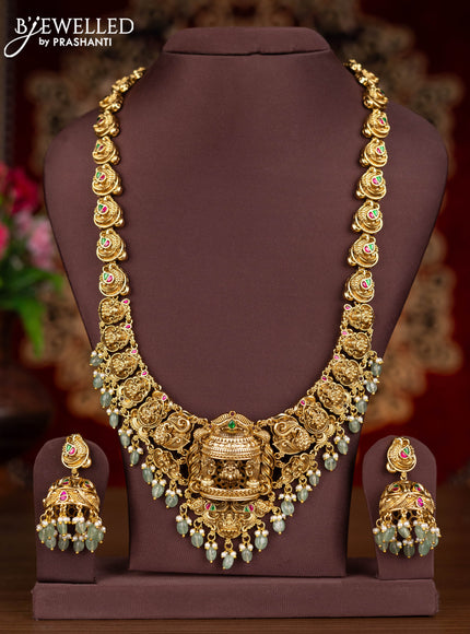 Antique haaram 3-D lakshmi design with kemp jadau stones and pearl & mint green beads hangings