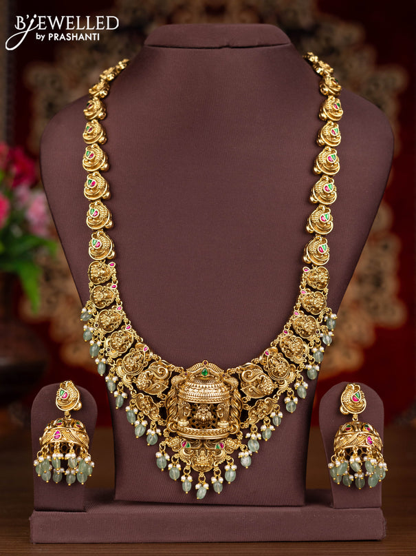 Antique haaram 3-D lakshmi design with kemp jadau stones and pearl & mint green beads hangings