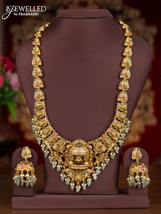 Antique haaram 3-D lakshmi design with kemp jadau stones and pearl & mint green beads hangings
