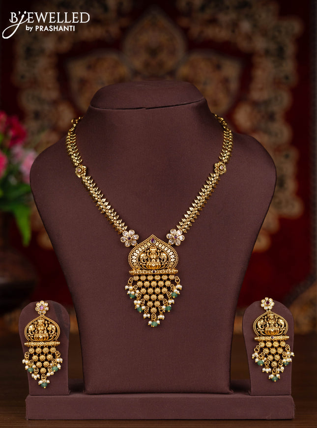 Antique necklace lakshmi design with pink kemp & kundan stones and pearl & mint green beads hangings