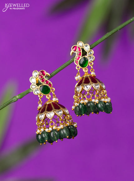 Jadau jhumka peacock design with kemp jadau kundan stones and green beads hangings
