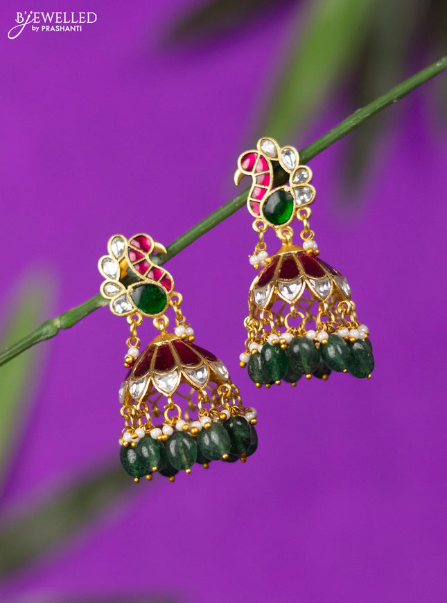 Jadau jhumka peacock design with kemp jadau kundan stones and green beads hangings