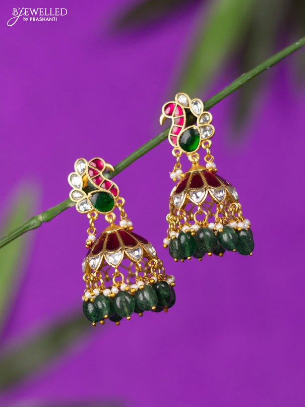 Jadau jhumka peacock design with kemp jadau kundan stones and green beads hangings