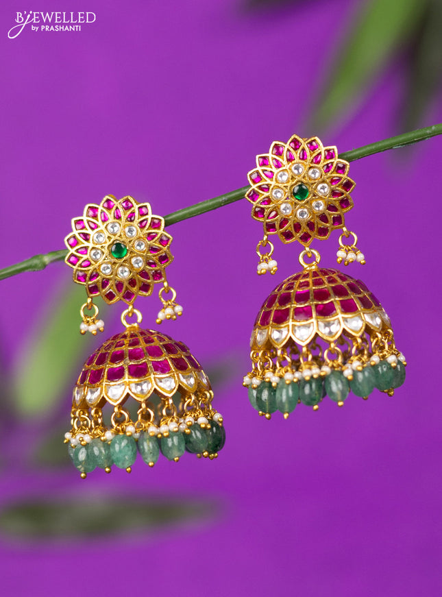 Jadau jhumka with kemp jadau kundan stones and mint green beads hangings