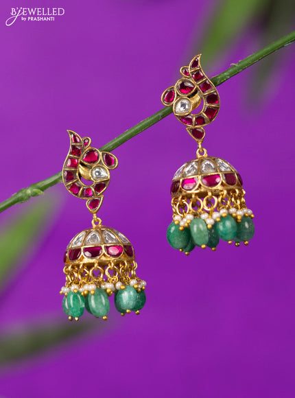 Jadau jhumka with kemp jadau kundan stones and mint green beads hangings