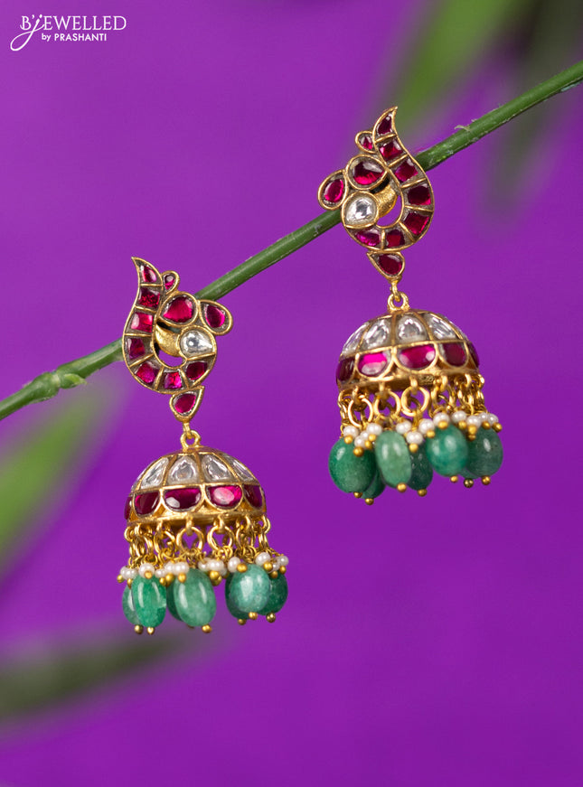 Jadau jhumka with kemp jadau kundan stones and mint green beads hangings