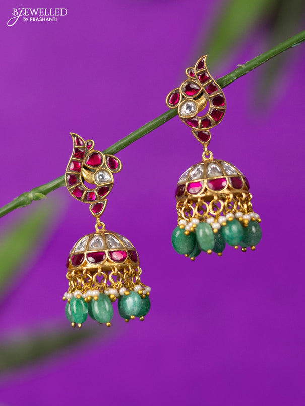 Jadau jhumka with kemp jadau kundan stones and mint green beads hangings