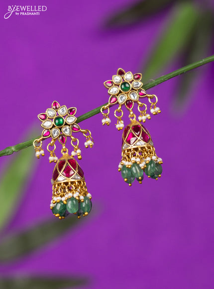 Jadau screw type jhumka with kemp jadau kundan stones and mint green beads hangings