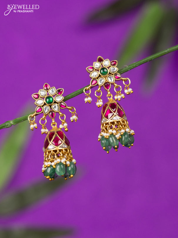 Jadau screw type jhumka with kemp jadau kundan stones and mint green beads hangings