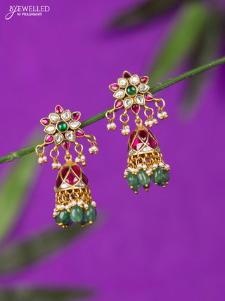 Jadau screw type jhumka with kemp jadau kundan stones and mint green beads hangings