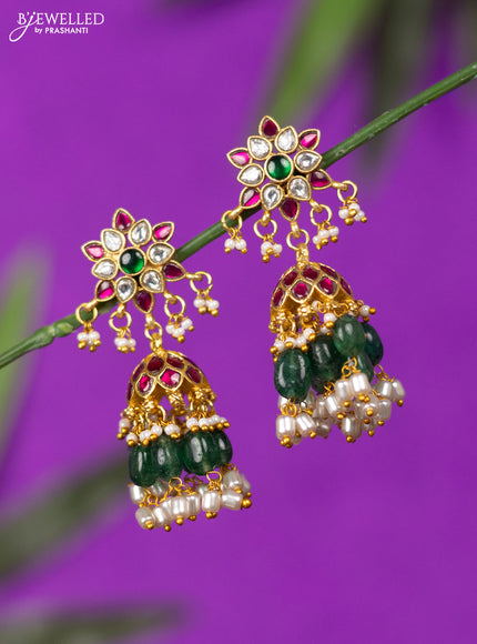 Jadau screw type jhumka with kemp jadau kundan stones and mint green beads hangings