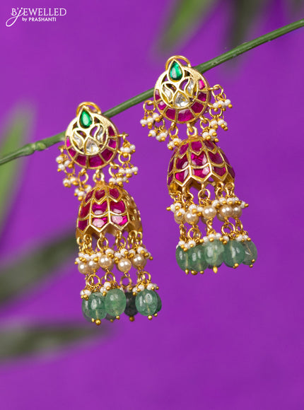 Jadau screw type jhumka with kemp jadau kundan stones and mint green beads hangings