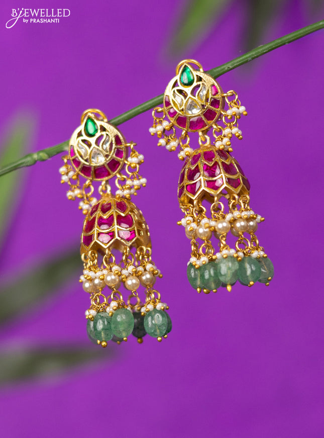 Jadau screw type jhumka with kemp jadau kundan stones and mint green beads hangings