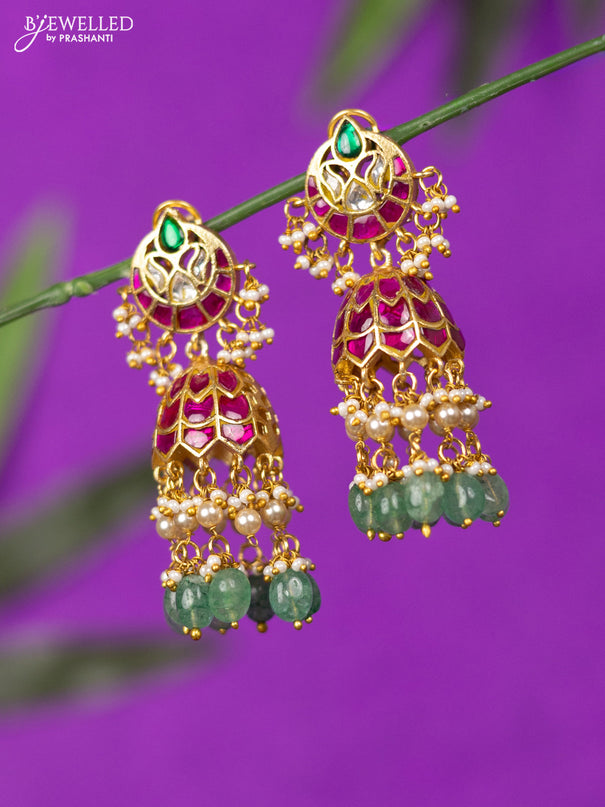 Jadau screw type jhumka with kemp jadau kundan stones and mint green beads hangings