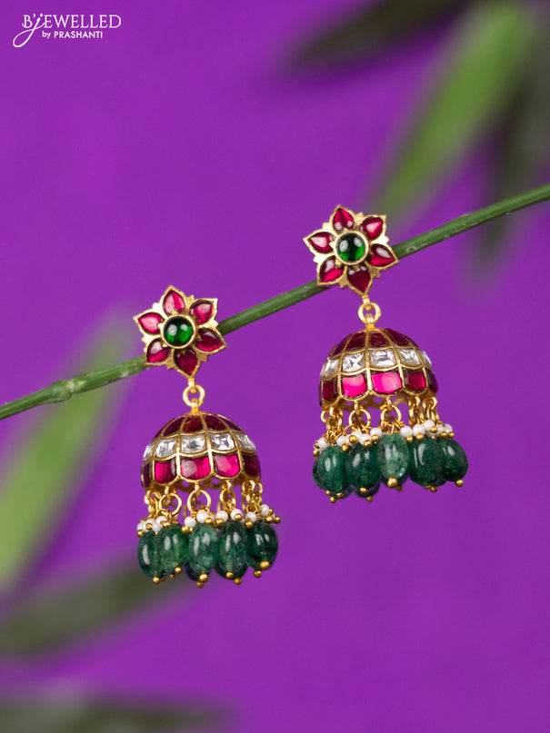 Jadau screw type jhumka with kemp jadau kundan stones and green beads hangings