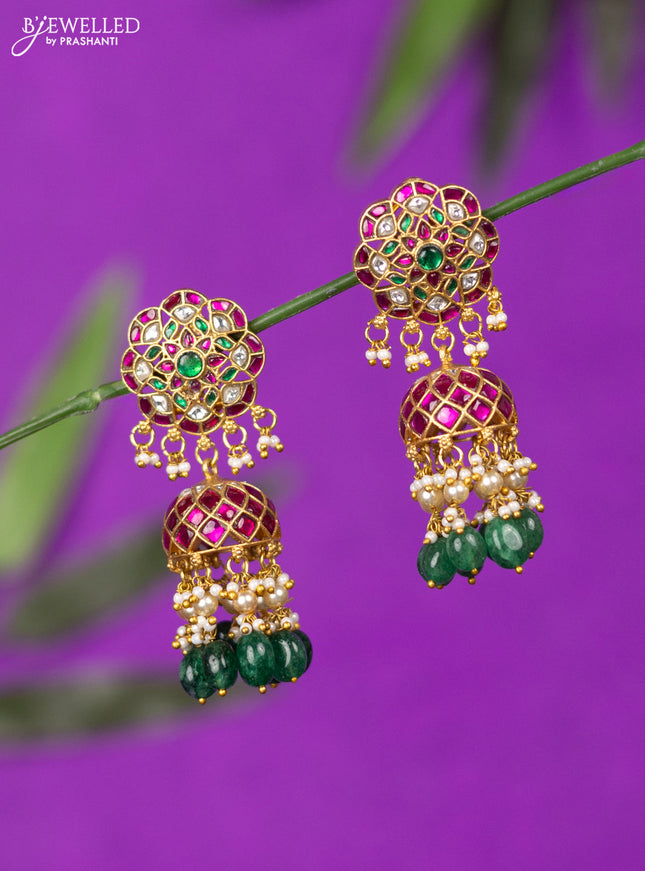 Jadau screw type jhumka with kemp jadau kundan stones and green beads hangings