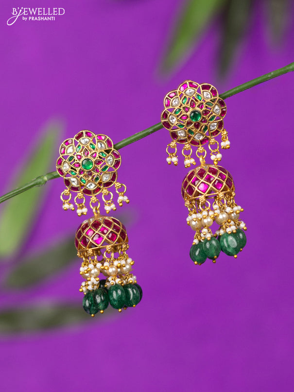 Jadau screw type jhumka with kemp jadau kundan stones and green beads hangings